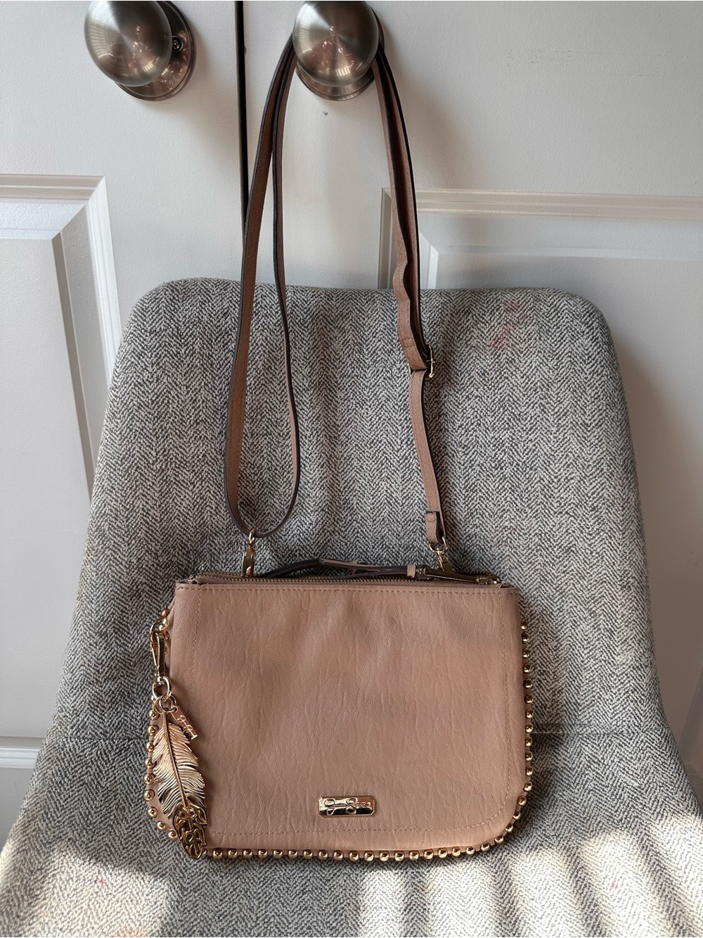Jessica Simpson Tan Stud-Trim Crossbody with Feather Charm